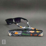 بند عینک ایگل سی مدل پهن طرح‌دار گل‌دار طوسی